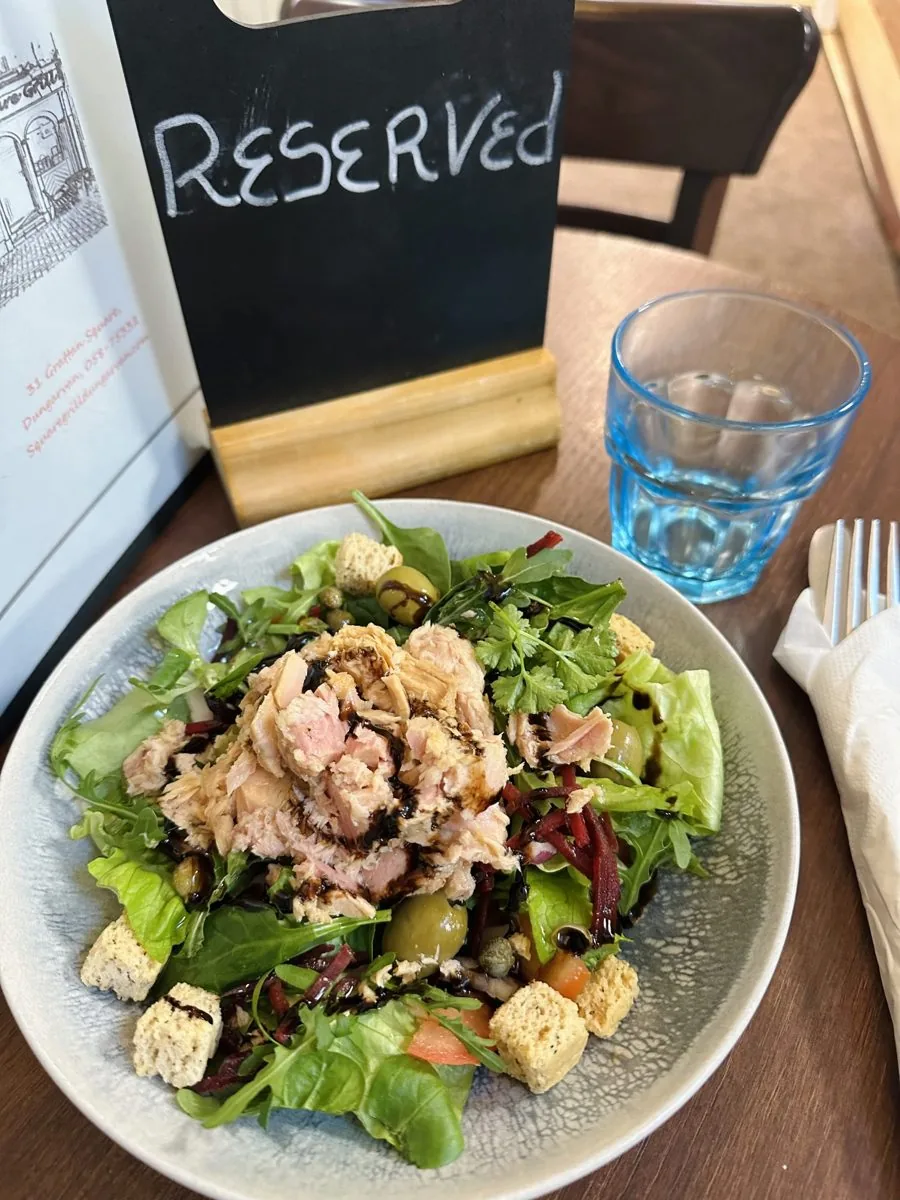 Tuna salad with olives, capers, beetroot and croutons